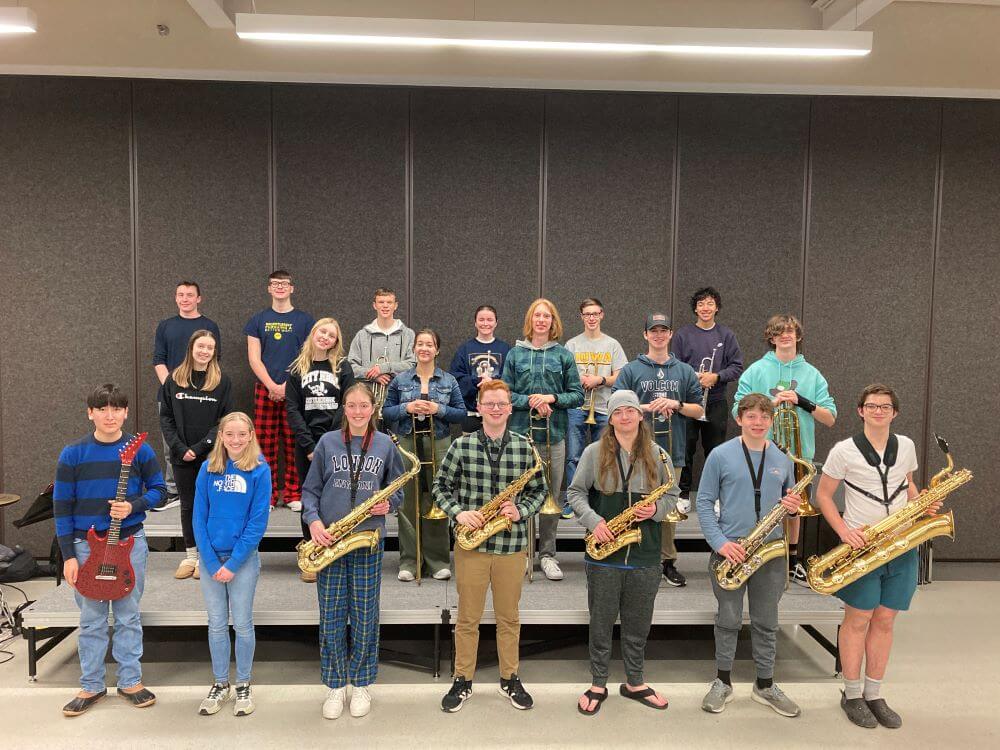 ensemble-students-posing-with-their-instruments