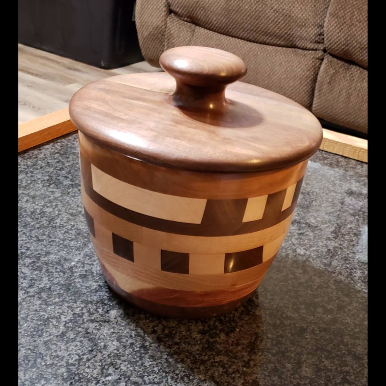 jar with lid made from multicolored woods