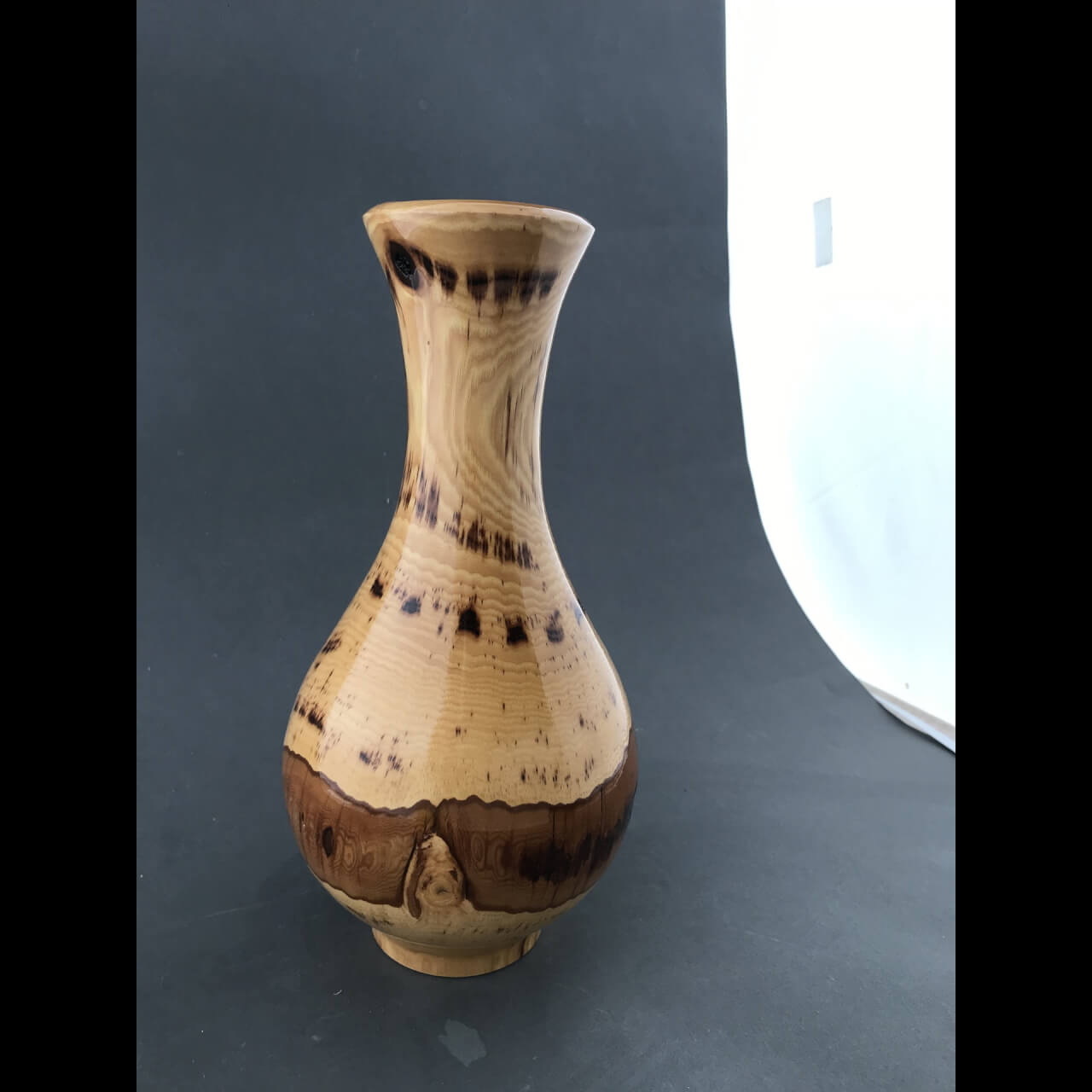 wooden vase with two-toned pattern