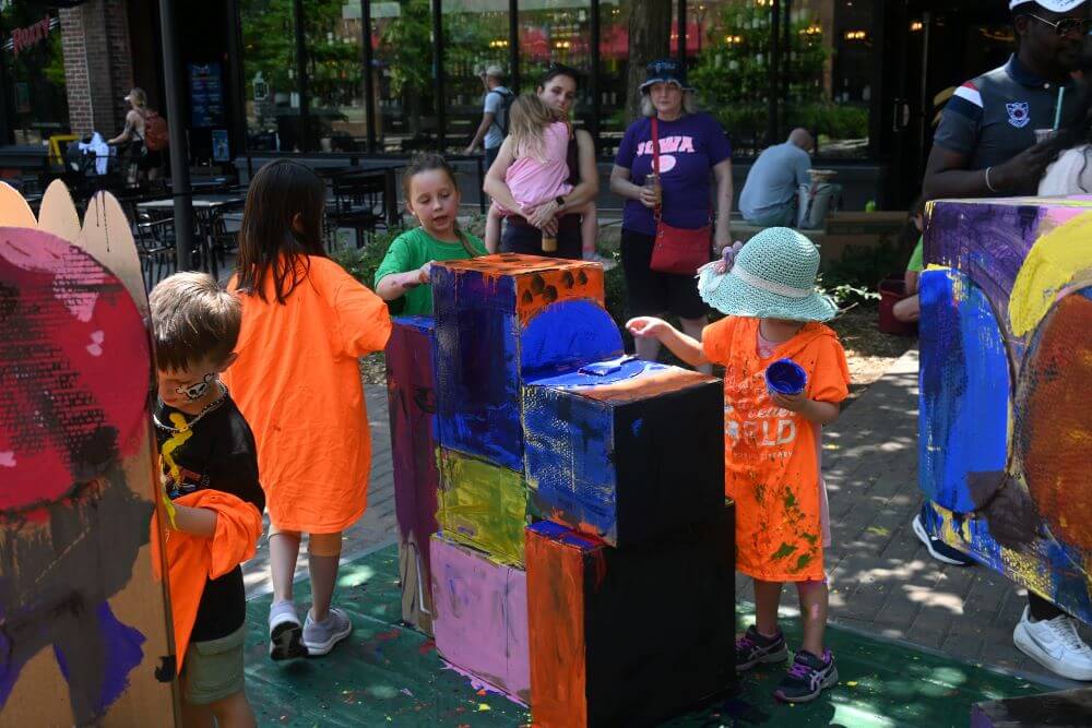 children-painting-boxes-as-part-of-paint-the-town