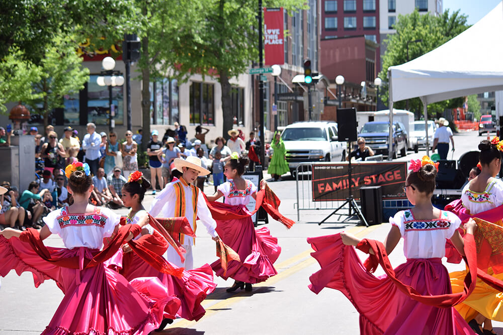 quad cities ballet folklorico dancing on the street at the iowa arts festival