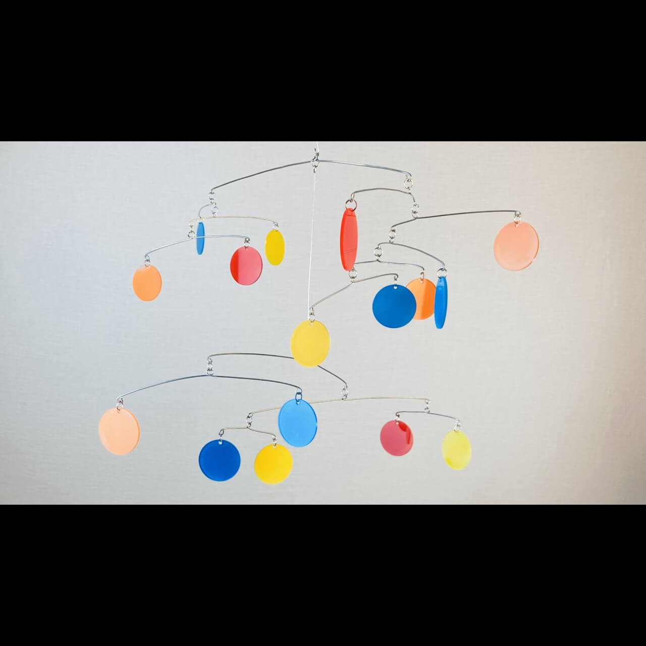 mobile made of colorful metal circles