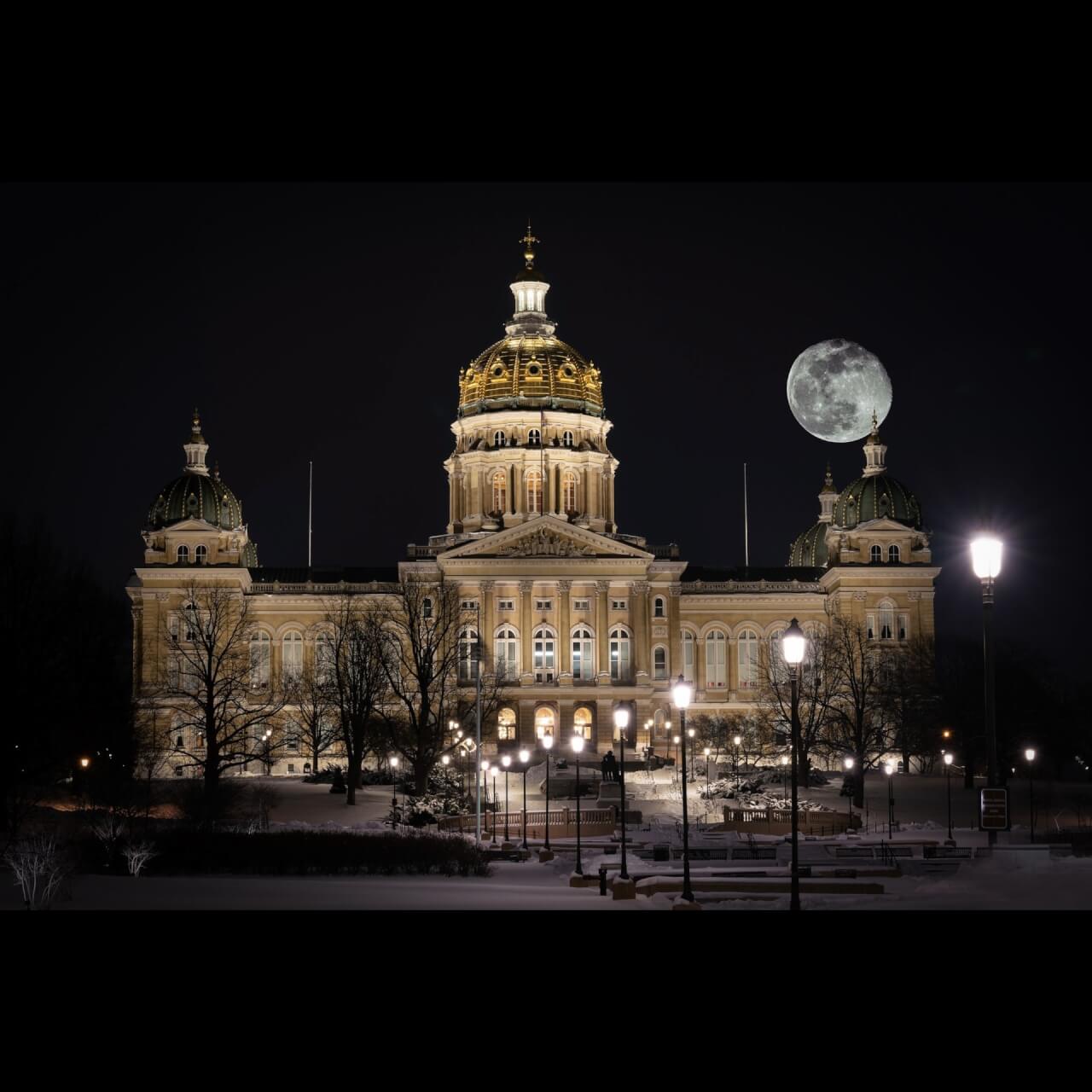 iowa state capitol with full moon in background